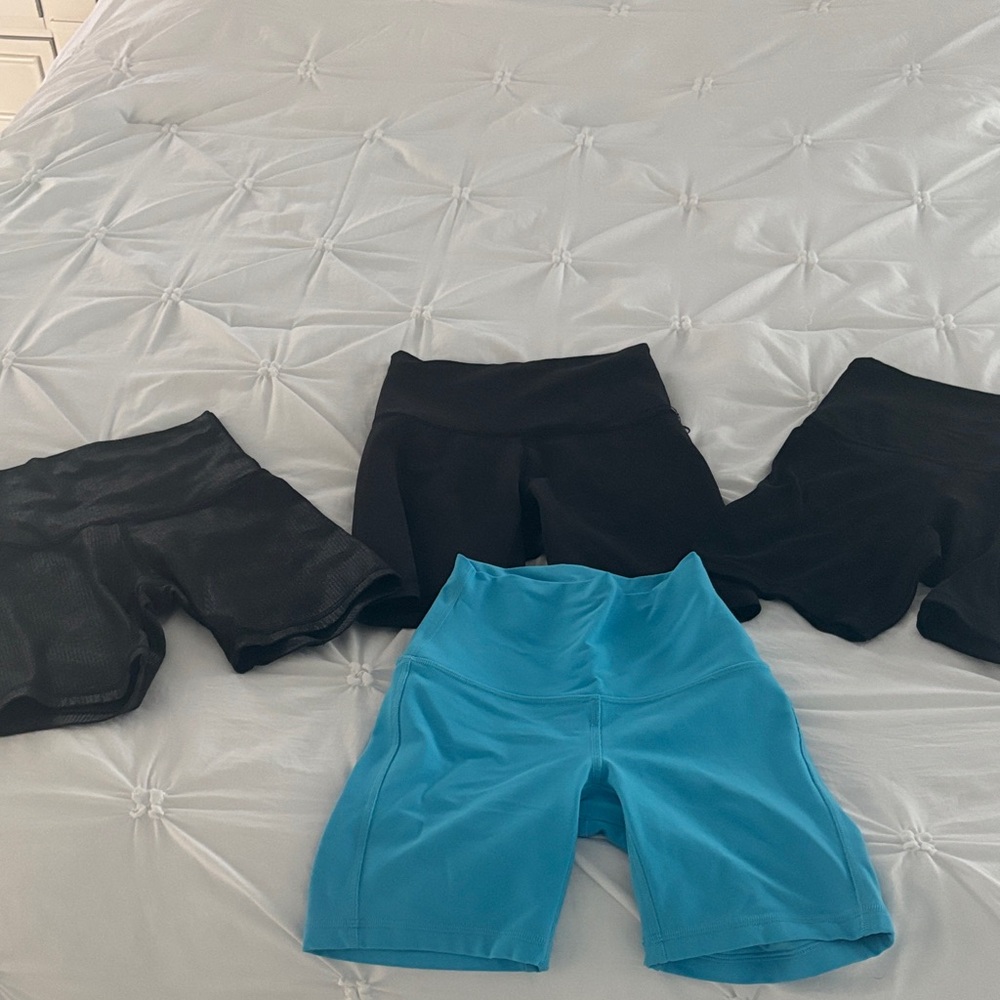 4 pairs of Lululemon bike shorts